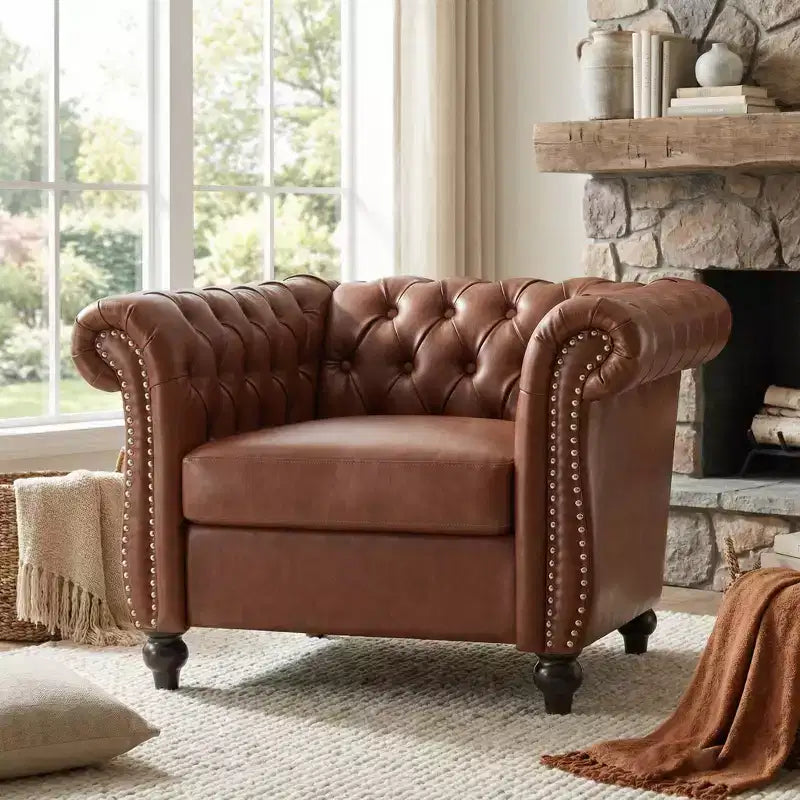 Fauteuil d'appoint capitonné en similicuir avec clous décoratifs